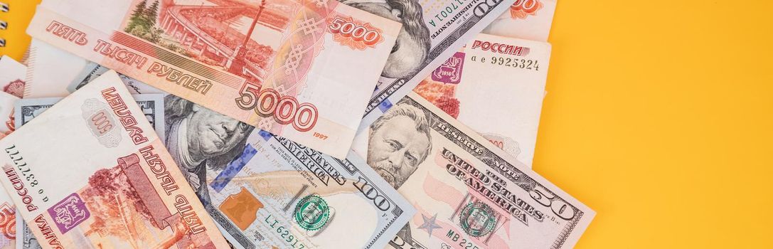 Russian ruble banknotes issued by the Bank of Russia. Financial system and economy of Russia. World monetary system.