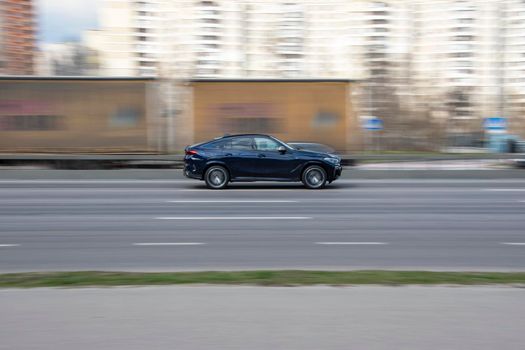 Ukraine, Kyiv - 6 April 2021: Blue BMW Other car moving on the street. Editorial