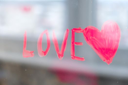 Red heart LOVE on a window, stay home, quarantine leisure, let's all be well, Valentines day, Love, Romance