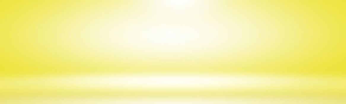 Abstract solid of shining yellow gradient studio wall room background