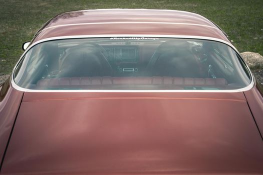 an old powerful classic American car. automotive classics. american maslkar. rear view