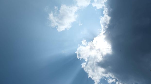 The blue sky in summer day. Blue sky white clouds. White clouds background. Nature weather of clear sky.