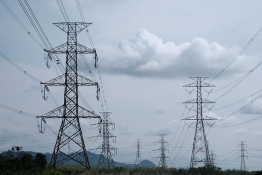 High voltage pole. High voltage tower on sky background.