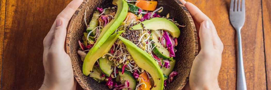 Mixed Green Salad with Grilled Salmon, Quinoa and Avocado on Wood Background Healthy Food Concept. BANNER, LONG FORMAT