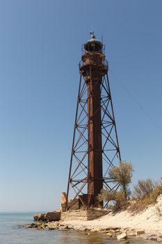 old eifell lighthouse on the seaside in Ukraine