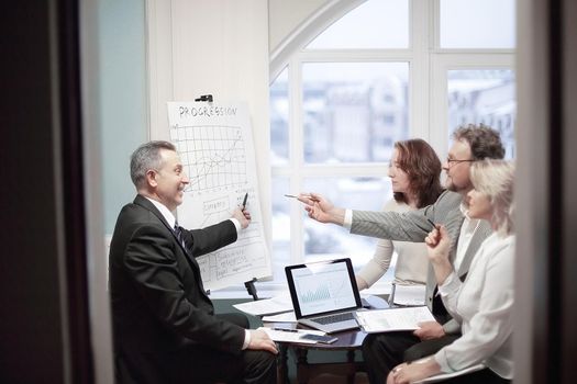group of senior businessmen discussing a new business project.the concept of partnership