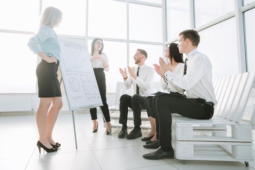 business team in the new office is discussing their possibilities . the concept of a startup