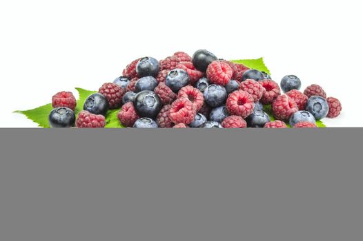 Blueberries raspberries isolated on white background
