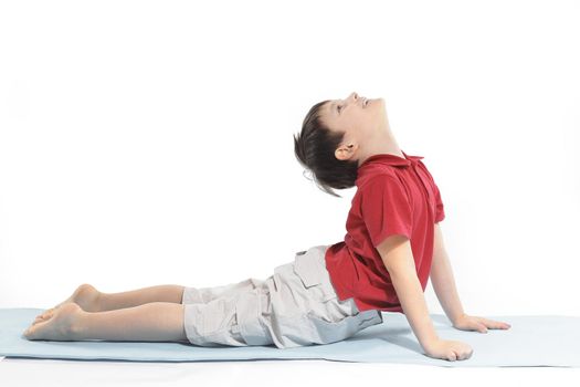 little boy does morning exercises.isolated on white background.
