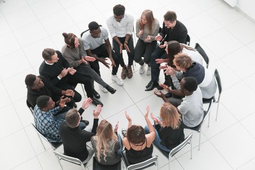 Groupmates listening to lecturer or speaker at conference