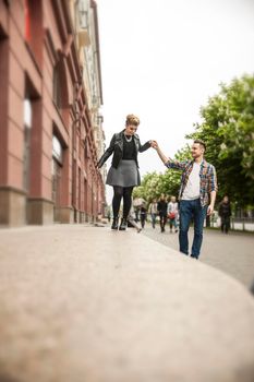 concept of happiness. loving couple on a walk in the city