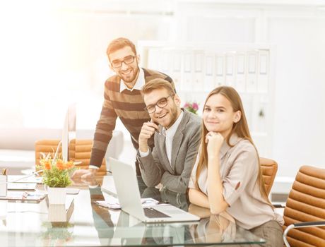 team of copywriters working on a new advertising project in the workplace in the Studio.the photo has a empty space for your text.