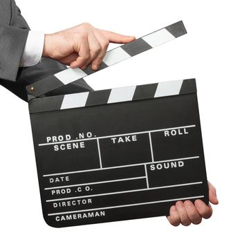 Closeup of male hands holding movie clapper board isolated on white background