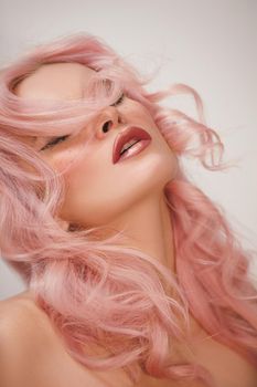 Soft-Girl Style with Pink Flying Hair, Fashion Makeup. Woman Face with Fake Freckles and Rose Hairstyle, Blush Rouge. Valentines Day Look, Womens Day, March 8 or Freshness Spring Style