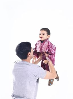 happy child.the father and the son.a child in Gypsy national costume.the photo with blank space for text