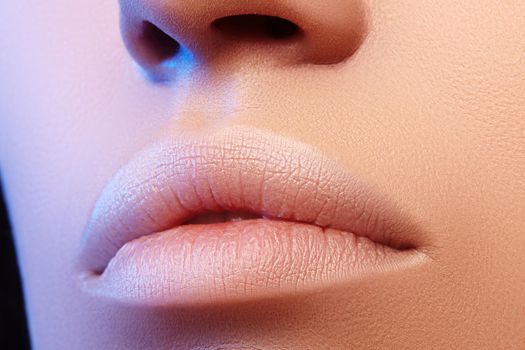 Perfect Natural Lip Makeup. Close Up Macro Photo with Beautiful Female Mouth. Plump Full Lips. Close-up Face Detail. Perfect Clean Skin, Light Fresh Lip Make-up. Beautiful Spa Tender Lips