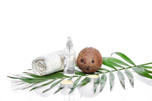 Organic cosmetics with coconut on white background. The concept for advertising cosmetics. Still life. Copy space