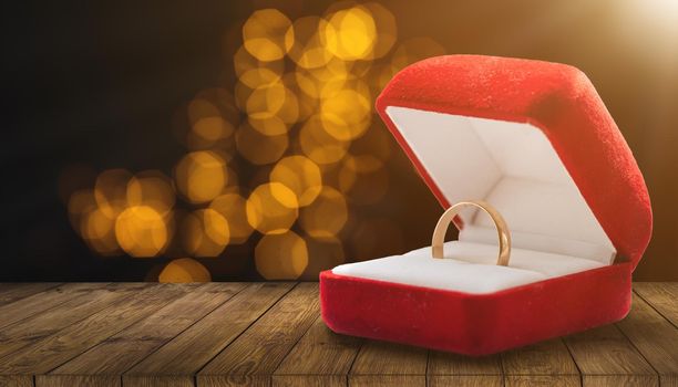 Gold ring, wedding ring in red box. The moment of a wedding, anniversary, engagement, or Valentine's Day. Happy day