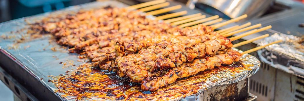 Typical Korean street food on a walking street of Seoul. Spicy fast food simply found at local Korean martket, Soul Korea. BANNER, LONG FORMAT