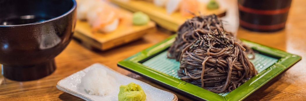 Korean buckwheat lamb served on a bamboo mat. BANNER, LONG FORMAT