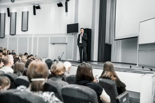 speaker with microphone for business conference. business presentations and business trainings
