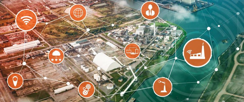 Industry 4.0 technology concept - Smart factory for fourth industrial revolution with icon graphic showing automation system by using robots and automated machinery controlled via internet network .