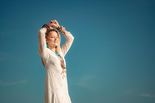fashionable young model in boho style dress