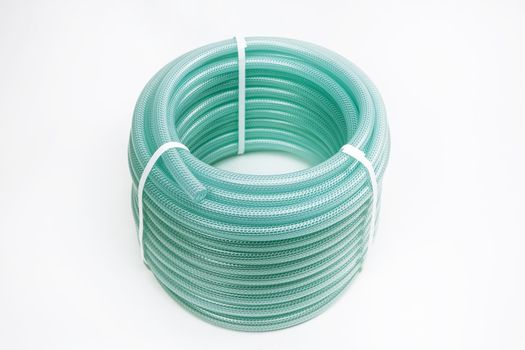 Hose wrapped in a bobbin and fastened with a plastic lock