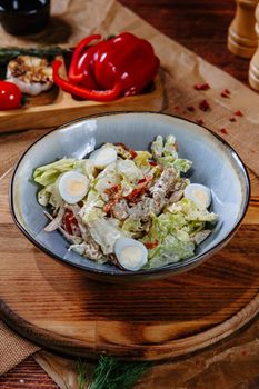 salad with quail eggs and dried tomatoes.