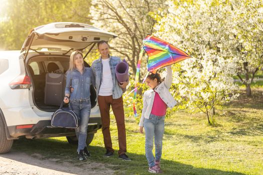 happy family enjoying road trip and summer vacation