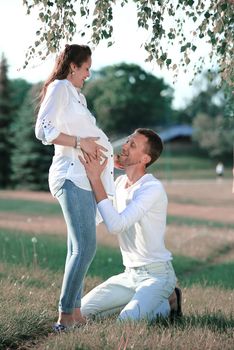 happy couple walking in the Park on a Sunny day