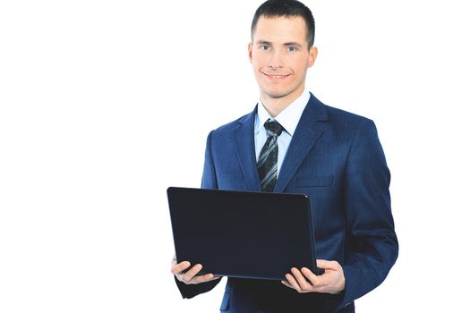 young businesswoman with a laptop on a white background, smiling and looking at the frame