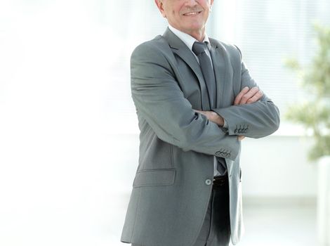 portrait of a successful Mature businessman in modern office photo with copy space