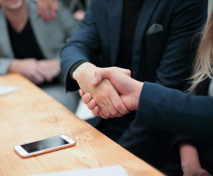 close up. business handshake during a work meeting. the concept of cooperation