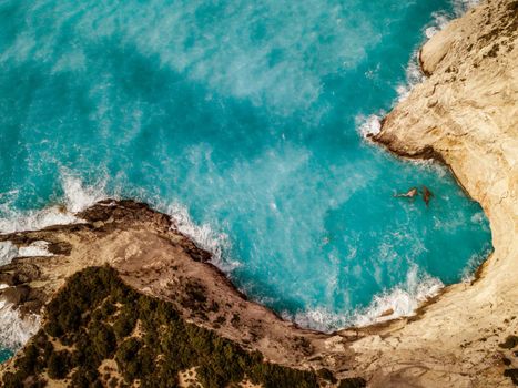 Aerial view from drone of amazing nature background. Azure coastline with rocky mountains and clear water of Mediterranean sea at sunny day.