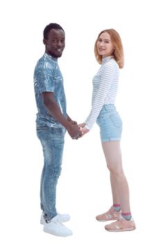 in full growth. beautiful couple holding each other's hands. isolated on white