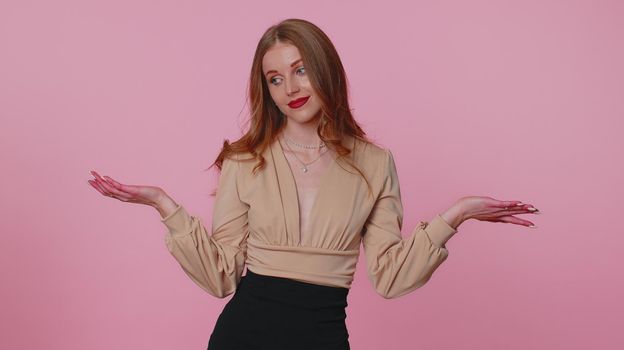 What why. Sincere businesswoman girl raising hands in indignant expression, asking reason of failure demonstrating disbelief irritation by troubles. Young casual woman isolated on pink wall background