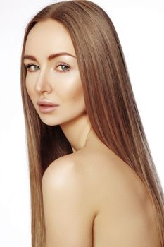 Beautiful yong woman with long straight brown hair. Sexy fashion model with smooth gloss hairstyle, keratin treatment