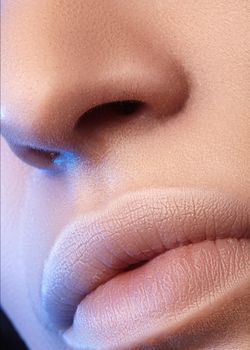 Moisturizing lip balm, lipstick. Close-up of a beautiful sexy lips. Nice full lips with lip makeup. Filler Injections, Plastic Surgery, Collagen and Treatments