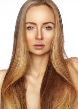 Beautiful yong woman with long straight shiny hair. Sexy fashion model with smooth gloss hairstyle, keratin treatment. Perfect clean skin