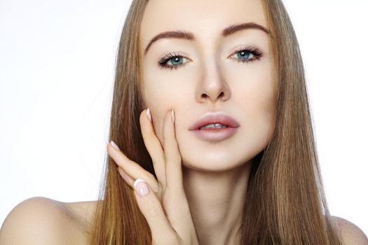 Portrait of beautiful woman with perfect clean skin. Spa look, Wellness and health Face. Daily Make-up. Skincare routine on white background