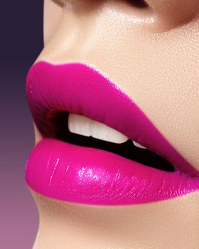 Beautiful bright Fashion Make-up on full Lips. Trend pink lip Makeup. Vivid shiny magenta Lipgloss