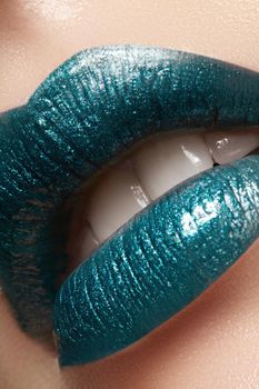 Glamour green Gloss Lip Make-up. Fashion Makeup Beauty Shot. Close-up Sexy full Lips with celebrate Aquamarine glossy lipstick