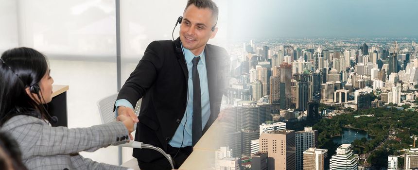 Business people wearing headset celebrate working in office . Call center, telemarketing, customer support agent provide service on telephone video conference call. broaden view