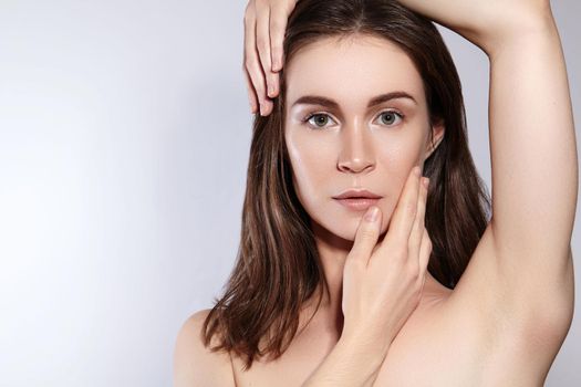 Beauty Woman Face Portrait. Beautiful Spa Model Girl with Perfect Fresh Clean Skin. Youth and Skin Care Concept.