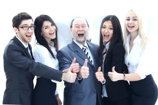 closeup head and business team showing thumb up.concept approval