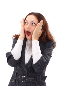 portrait of surprised young woman over grey background
