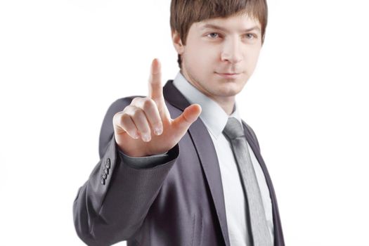 close up. businessman presses his finger on the virtual point.isolated on grey background.