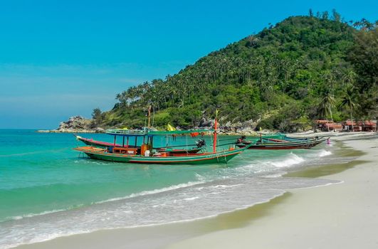 Tropical beach, traditional long tail boats, Gulf of Thailand, Thailand.