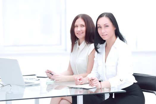 business woman and her assistant at the office Desk.